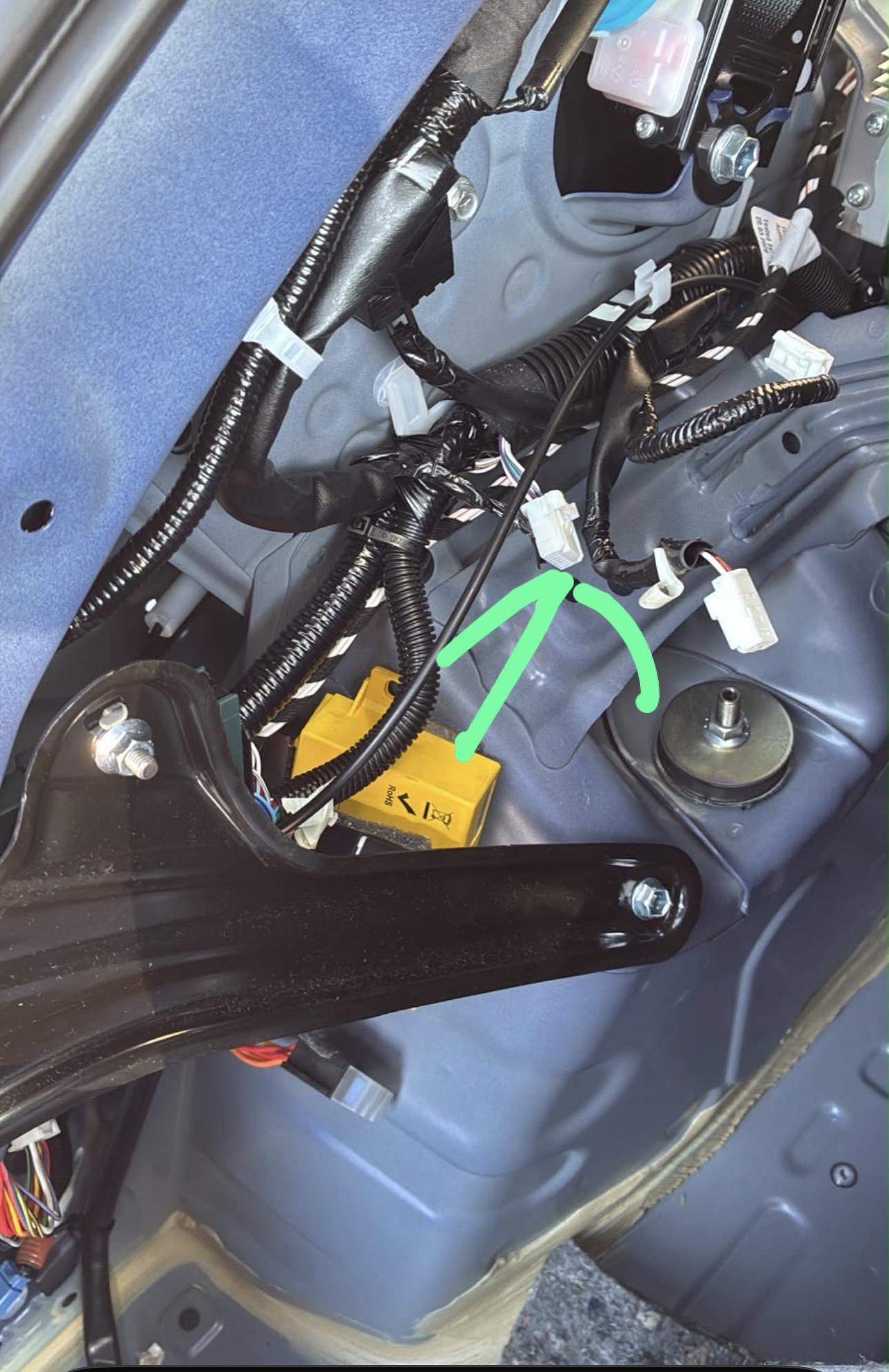 TOYOTA Yaris Cross White blanking cap the covers the wiring harness on the near side rear inner wing on the 1/4 panel