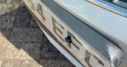 VAUXHALL Mokka front number plate plastic mounting onto bumper